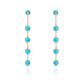 Natural turquoise beads drop earrings set in fine gold by Fantasilvia Fine Jewelry.
