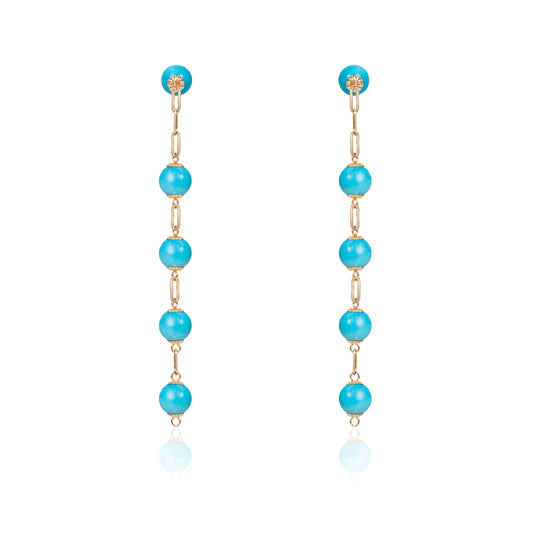 Natural turquoise beads drop earrings set in fine gold by Fantasilvia Fine Jewelry.
