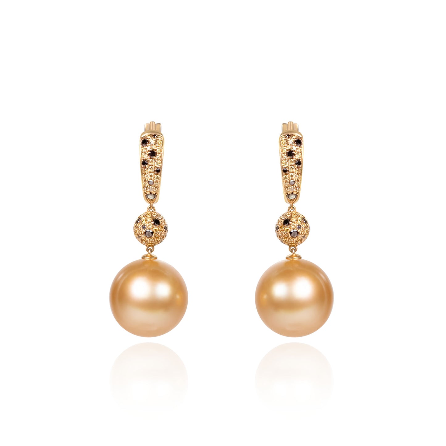 Black diamond and South Sea golden pearl dangle earrings crafted in gold by Fantasilvia Fine Jewelry.
