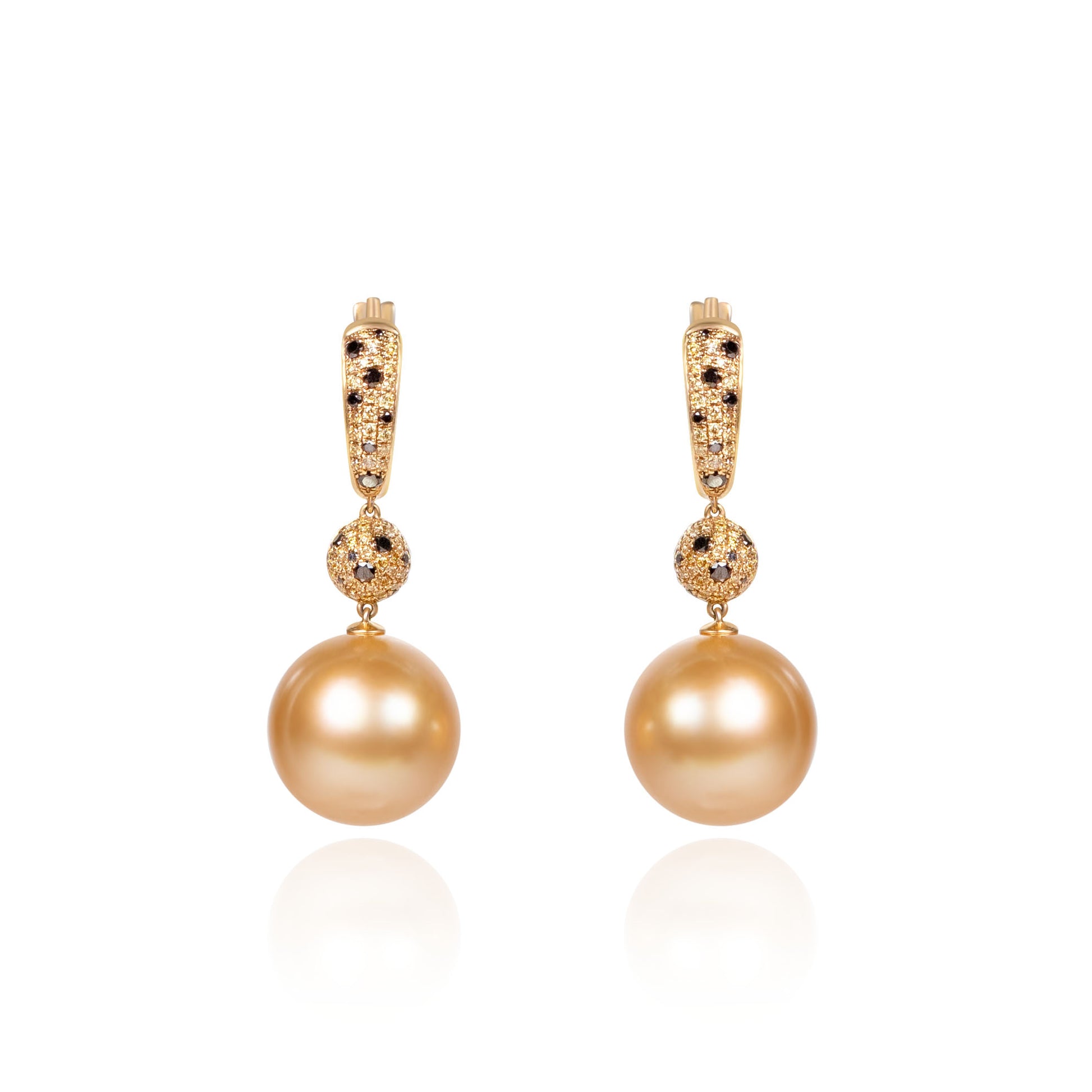 Black diamond and South Sea golden pearl dangle earrings crafted in gold by Fantasilvia Fine Jewelry.
