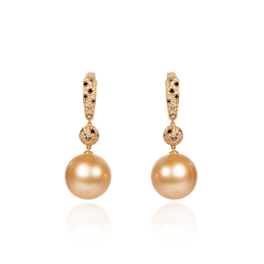Black diamond and South Sea golden pearl dangle earrings crafted in gold by Fantasilvia Fine Jewelry.
