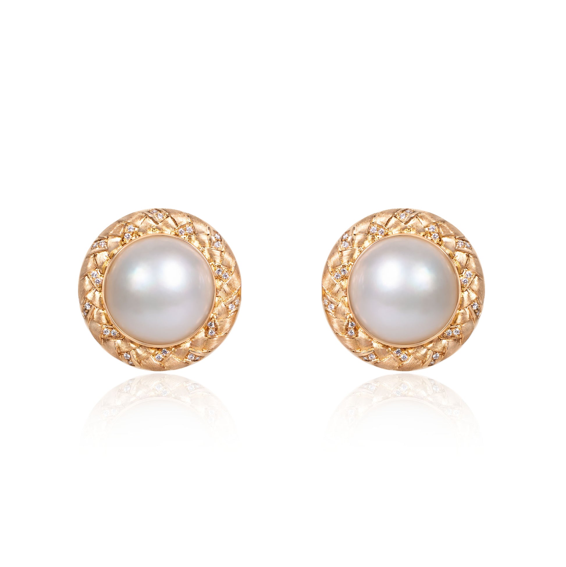 Natural mabe pearl stud earrings in fine gold by Fantasilvia Fine Jewelry.

