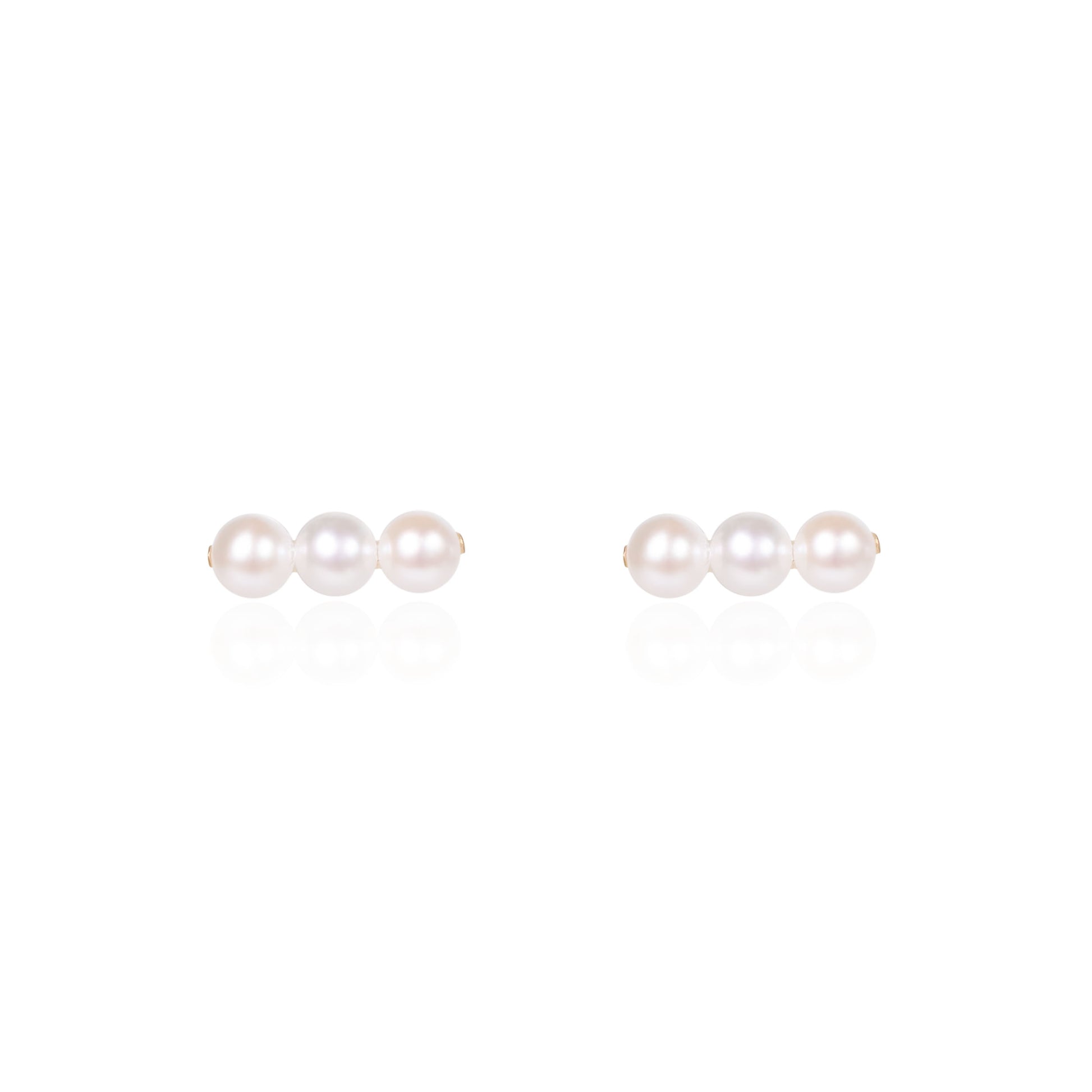Akoya pearl stud earrings in fine gold by Fantasilvia Fine Jewelry.
