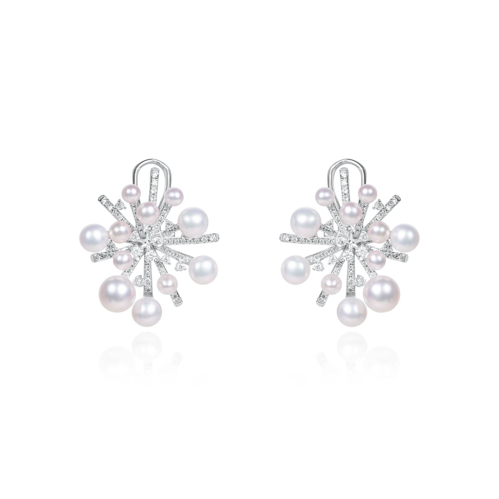 Snowflake-inspired freshwater pearl and diamond brooch crafted by Fantasilvia Fine Jewelry
