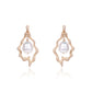 Diamond baroque drop earrings crafted in fine gold by Fantasilvia Fine Jewelry.
