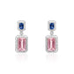 Natural pink morganite and blue sapphire drop earrings in 18K white gold with diamond halo by Fantasilvia Fine Jewelry.
