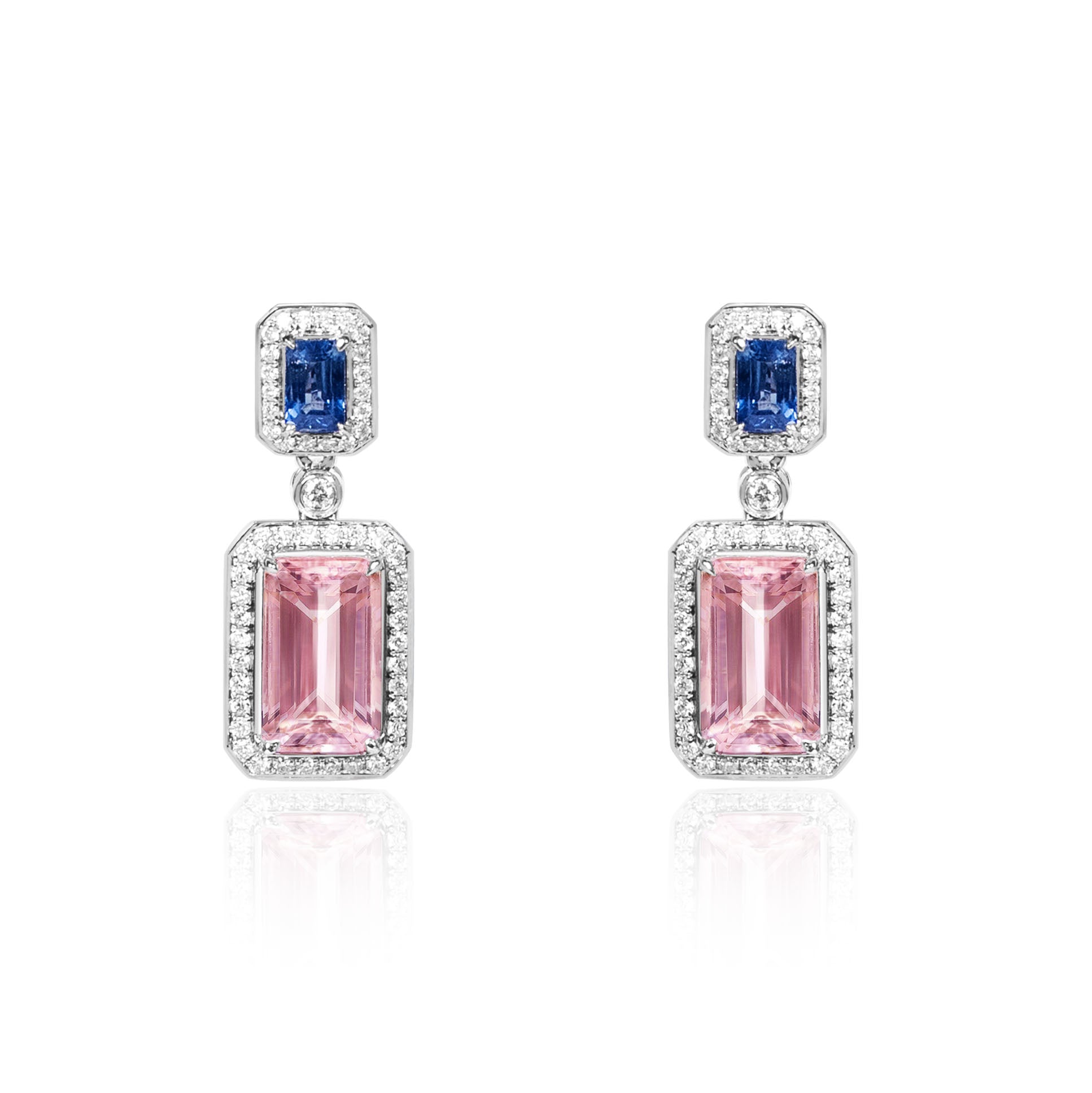 Natural pink morganite and blue sapphire drop earrings in 18K white gold with diamond halo by Fantasilvia Fine Jewelry.
