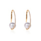 South Sea pearl and diamond hoop earrings in fine gold by Fantasilvia Fine Jewelry.
