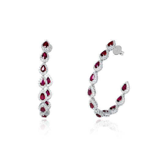 18K white gold hoop earrings with pear-shaped natural rubies and diamond halos.
