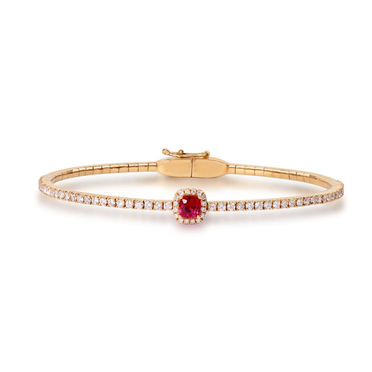 Natural spinel and diamond stretch bangle crafted in 18K gold by Fantasilvia Fine Jewelry.
