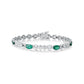 Natural diamond and emerald bracelet crafted in 18K gold by Fantasilvia Fine Jewelry.
