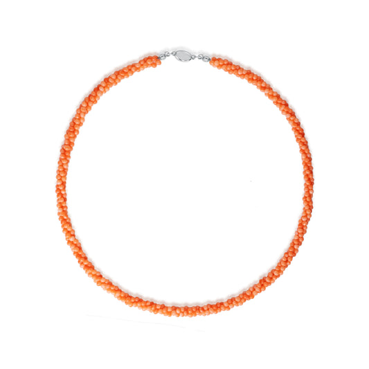 Natural coral beads choker featuring vivid orange beads and minimalist design, crafted by Fantasilvia Fine Jewelry.
