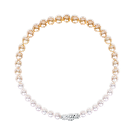 Gradient South Sea pearl strand necklace featuring 9–11mm pearls transitioning from white to golden tones, crafted by Fantasilvia Fine Jewelry.
