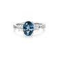 Oval tanzanite and diamond ring with natural gemstones by Fantasilvia Fine Jewelry.

