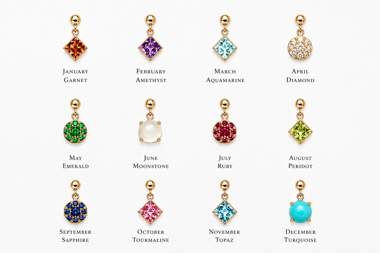 Collection of twelve detachable natural birthstone charms in 14K solid gold for the Spell My Stars necklace, including garnet, emerald, ruby, and sapphire.