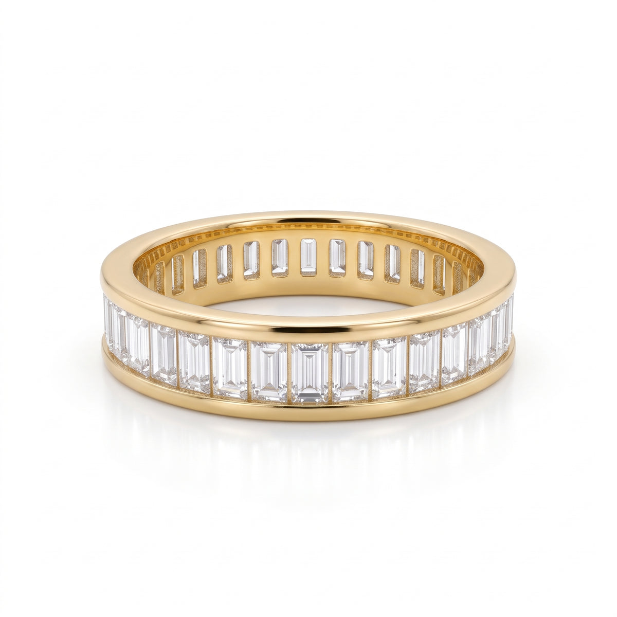 Front view of an 18K solid yellow gold eternity band featuring channel-set baguette lab-grown diamonds