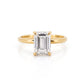 Front view of a 3.28-carat emerald cut lab-grown diamond ring set in an 18K solid yellow gold band.