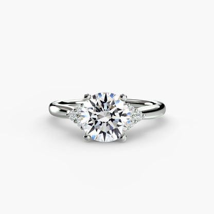 Solitaire with Cluster Shoulders Fantasilvia Jewelry
