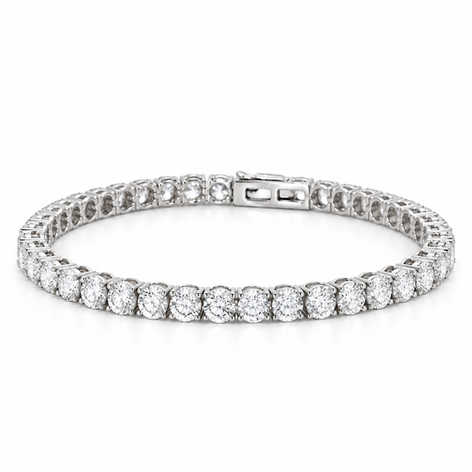 18K white gold lab-grown diamond tennis bracelet featuring a continuous row of round brilliant-cut diamonds in classic four-prong settings with a secure box clasp.